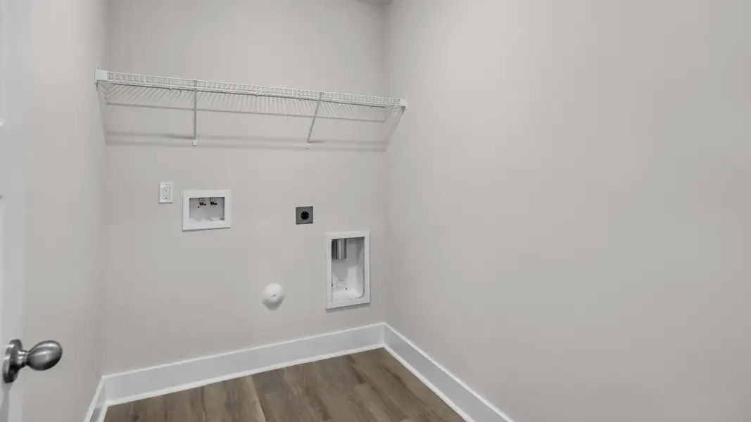 Representative unfurnished interior of a home built from the Forrester by D.R. Horton in The Highlands at Cedar Hill Landing, Navassa (Image 35).