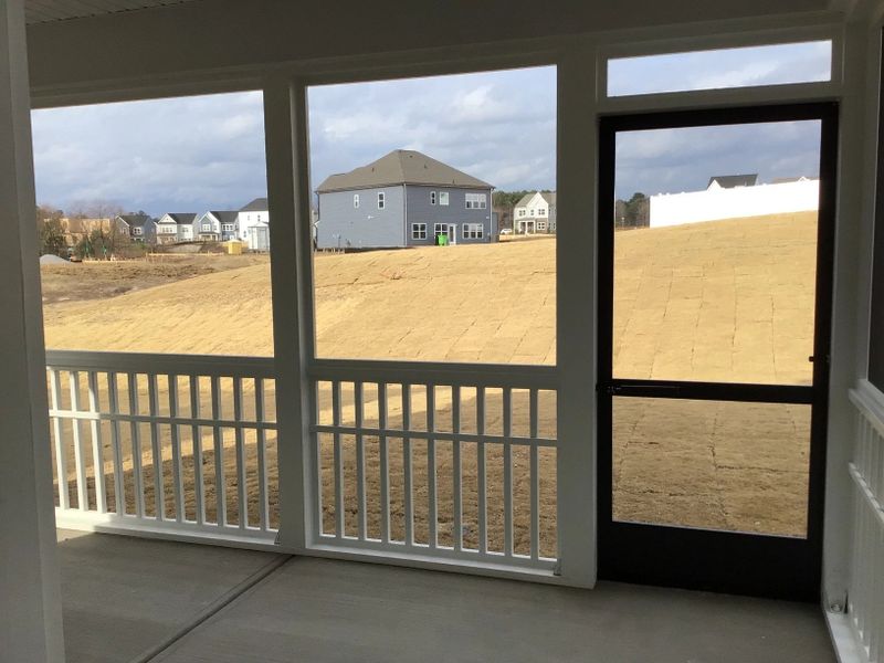 Screened-In Porch featuring the AW Collection® Coastal - A breezy spot for staycation moments.