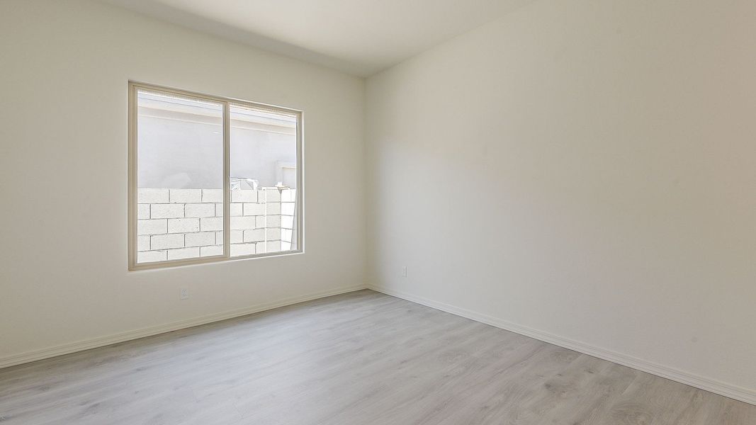 Furnished interior view inside a new home in Windrose, Waddell (Image 23).