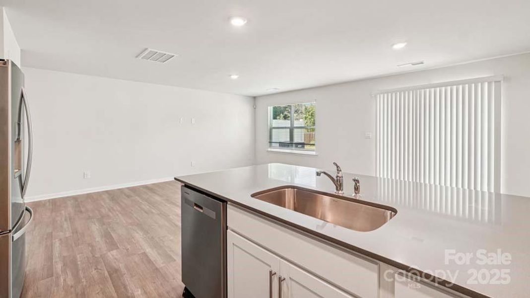 Furnished interior view inside a new home in Mallard Creek Townhomes, Charlotte (Image 5). Furnished interior view inside a new home in Mallard Creek Townhomes, Charlotte (Image 5).
