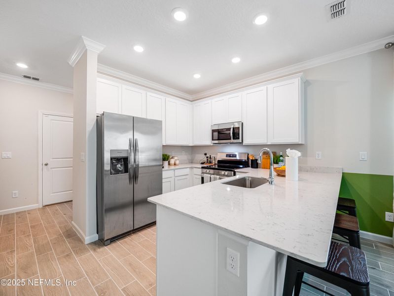 Furnished interior view inside a new home in Silver Falls Townhomes at Silverleaf, St. Augustine (Image 21). Furnished interior view inside a new home in Silver Falls Townhomes at Silverleaf, St. Augustine (Image 21).