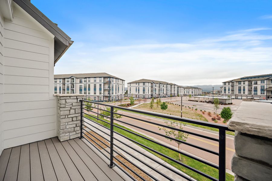 Exterior details and patio area of a home in The Commons at Victory Ridge, Colorado Springs (Image 25).