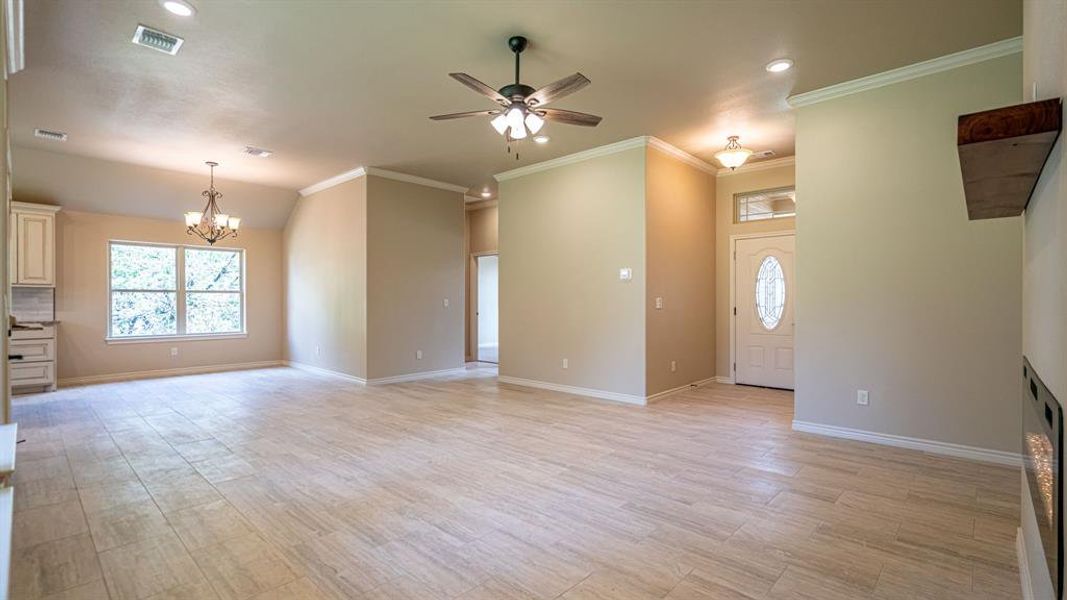 View from living room showing living, dining and front door View from living room showing living, dining and front door