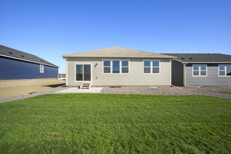 Exterior details and patio area of a home in The Glen-12, Colorado Springs (Image 3). Exterior details and patio area of a home in The Glen-12, Colorado Springs (Image 3).