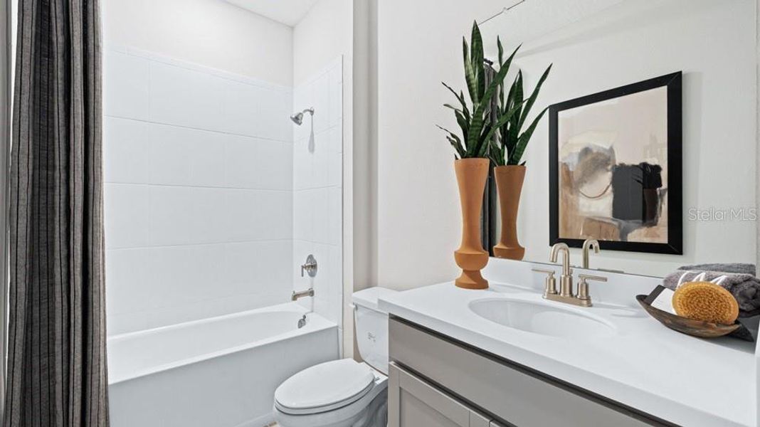 Furnished interior view inside a new home in Palms at Coasterra, Palmetto (Image 3). Furnished interior view inside a new home in Palms at Coasterra, Palmetto (Image 3).