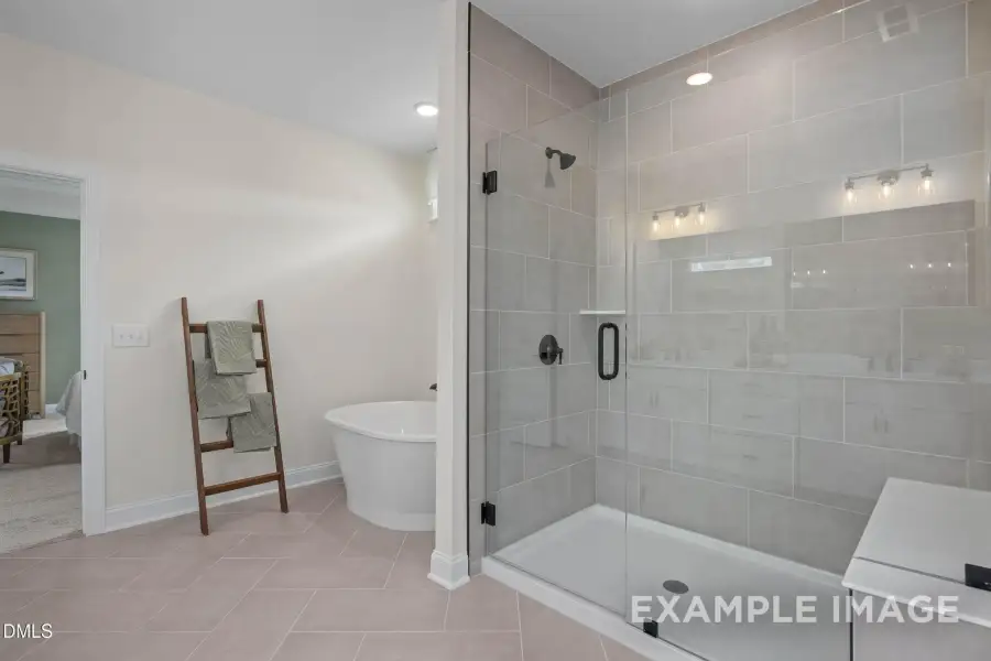 Furnished interior view inside a new home in Addison West, Holly Springs (Image 17).