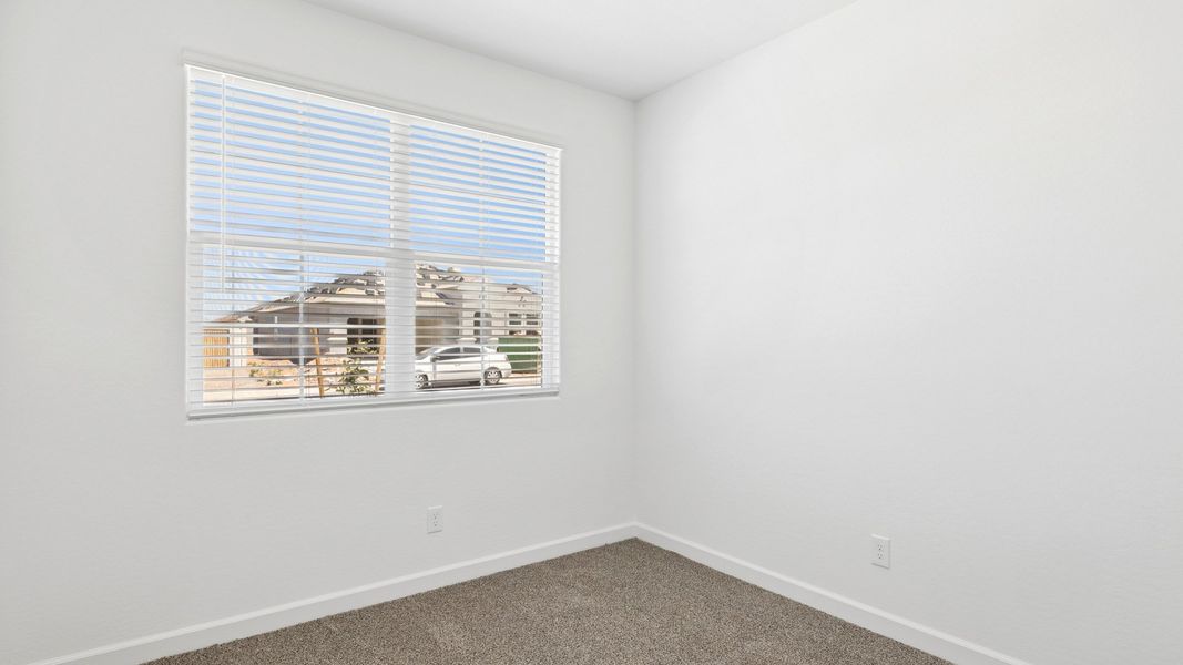 Representative unfurnished interior of a home built from the Raven by D.R. Horton in Magma Ranch Vistas, Florence (Image 13).