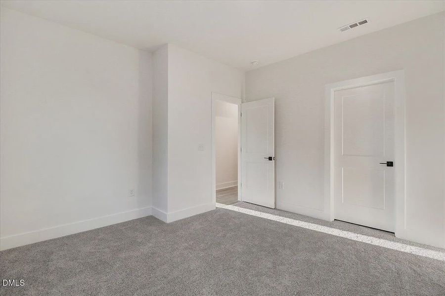 Spacious, unfurnished interior of a new home in Charlotte's Ridge, Middlesex (Image 28).