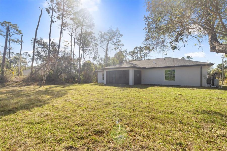 Exterior details and patio area of a home in , North Port (Image 18).