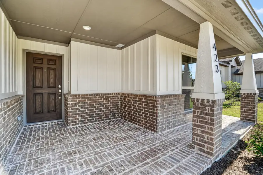 Exterior details and patio area of a home in Craftsman's Corner, Cleburne (Image 3).