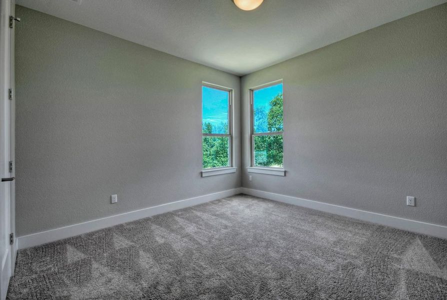 Representative unfurnished interior of a home built from the Madera II by Giddens Homes in Scofield Farms Estates, Georgetown (Image 287).