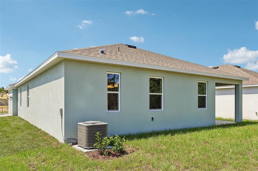 Exterior details and patio area of a home in Brack Ranch, St. Cloud (Image 21).