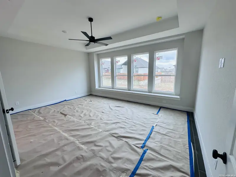 In-progress construction of a new home in Village at Three Oaks, Seguin, TX (Image 17).