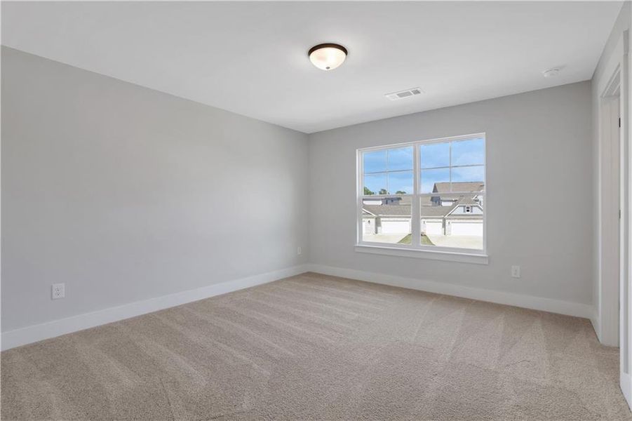 Spacious, unfurnished interior of a new home in Cambridge, Flowery Branch (Image 40).