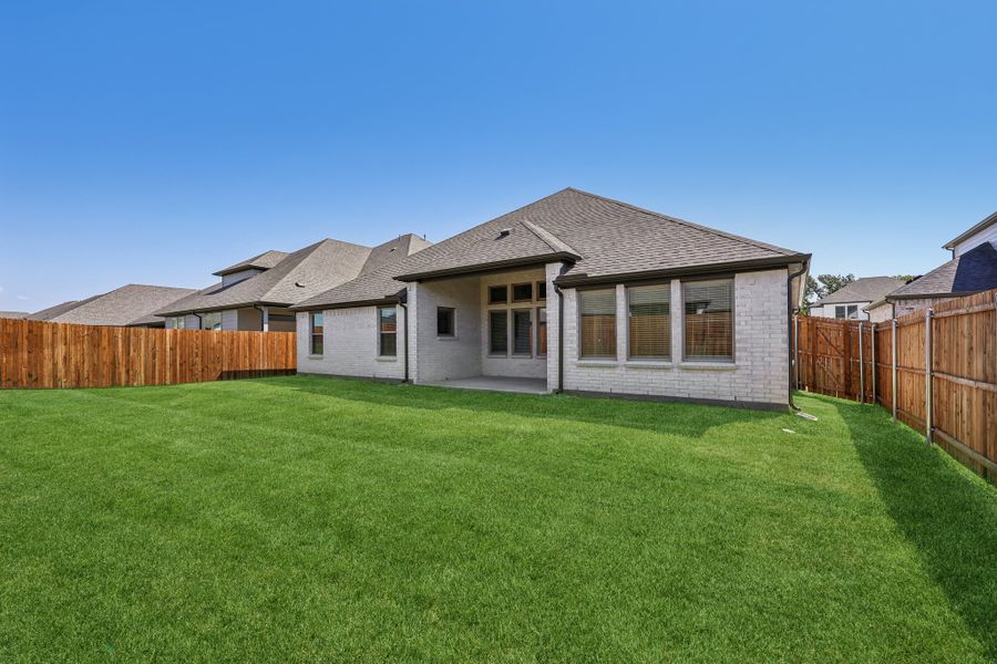 Covered Patio in the Gilmour II home plan by Trophy Signature Homes