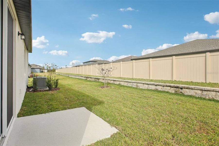 Exterior details and patio area of a home in Two Rivers - Premier Series, Zephyrhills (Image 19). Exterior details and patio area of a home in Two Rivers - Premier Series, Zephyrhills (Image 19).
