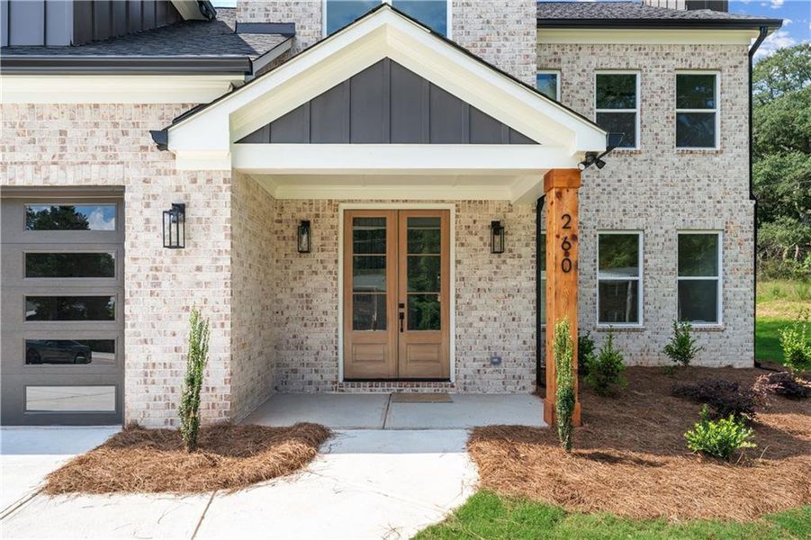 Front exterior of a new home in , Lawrenceville, GA, highlighting curb appeal (Image 27).