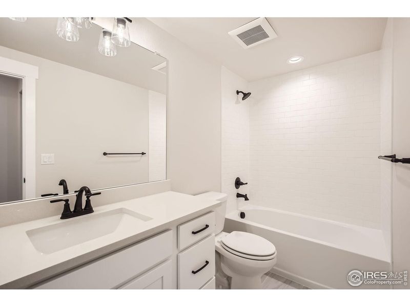 Furnished interior view inside a new home in RainDance, Windsor (Image 6).