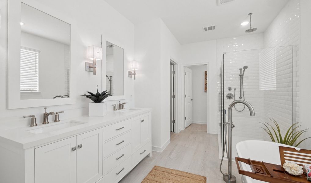 Primary bath with glass shower enclosure