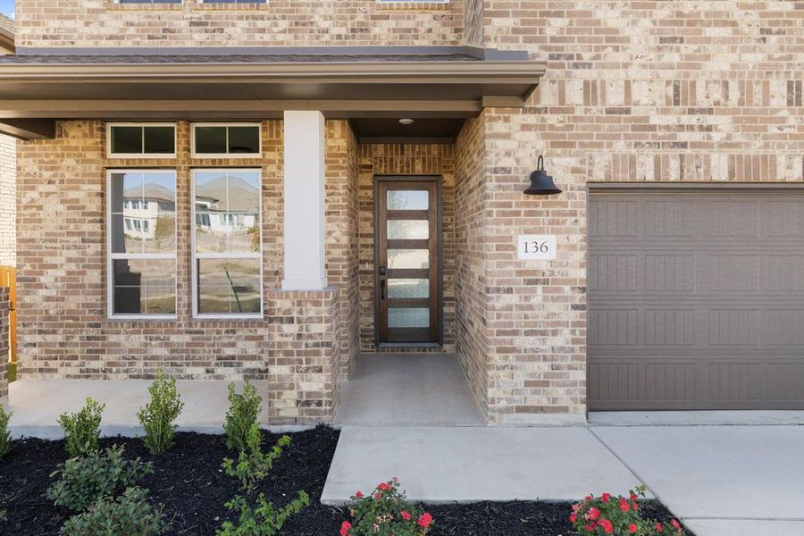 Exterior details and patio area of a home in Lariat, Liberty Hill (Image 3).