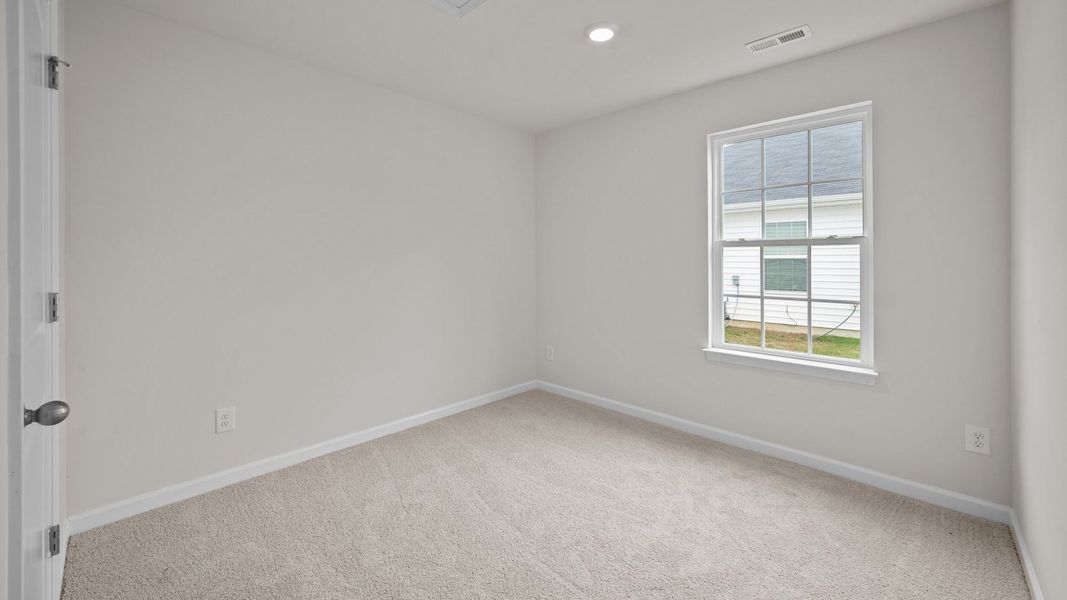 Spacious, unfurnished interior of a new home in Hobbs Farm, Ayden (Image 12).
