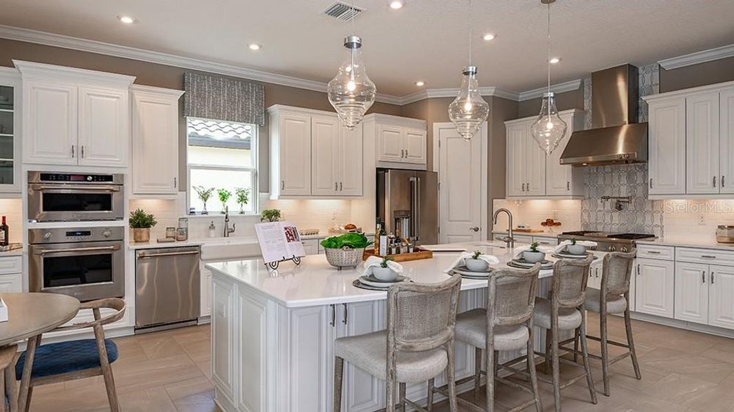 Furnished interior view inside a new home in Esplanade at Wiregrass Ranch, Wesley Chapel (Image 13).