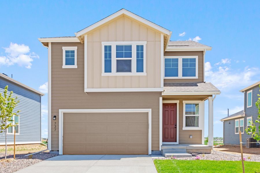 Representative exterior photo of a completed home built from the Bloom Series - Violet by Brightland Homes in Granary, Johnstown, CO (Image 11). Representative exterior photo of a completed home built from the Bloom Series - Violet by Brightland Homes in Granary, Johnstown, CO (Image 11).