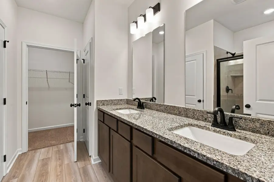 These pictures are of another unit of the same floor plan. Design selections will vary.