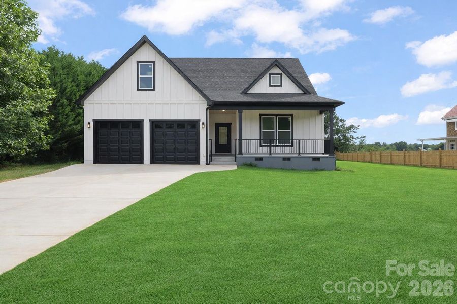 View of front of home.Ai grass