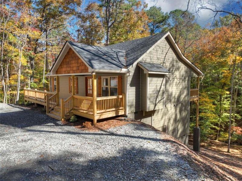 Exterior details and patio area of a home in , Ellijay (Image 17).