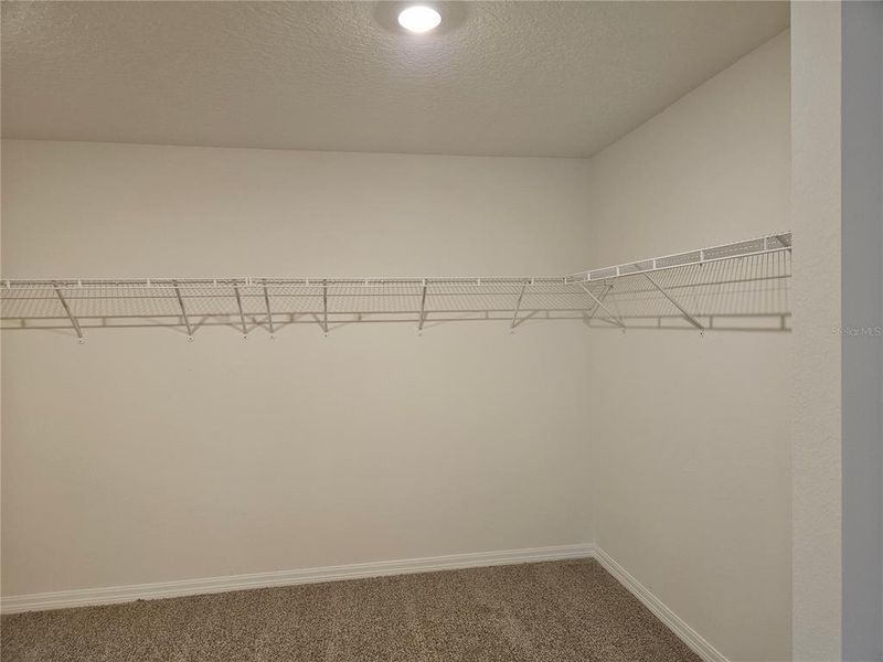 Spacious, unfurnished interior of a new home in Lawson Dunes - Signature Series, Haines City (Image 37).