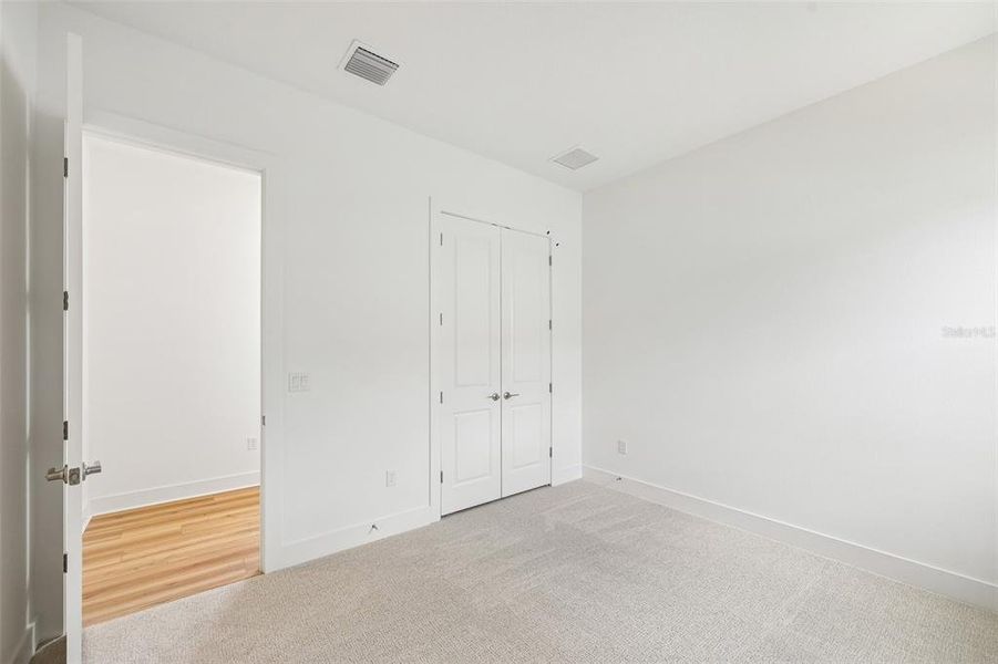 Spacious, unfurnished interior of a new home in River Preserve Estates, Parrish (Image 22).