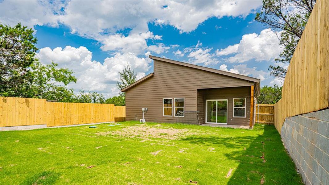 Front exterior of a new home in , Granbury, TX, highlighting curb appeal (Image 28).