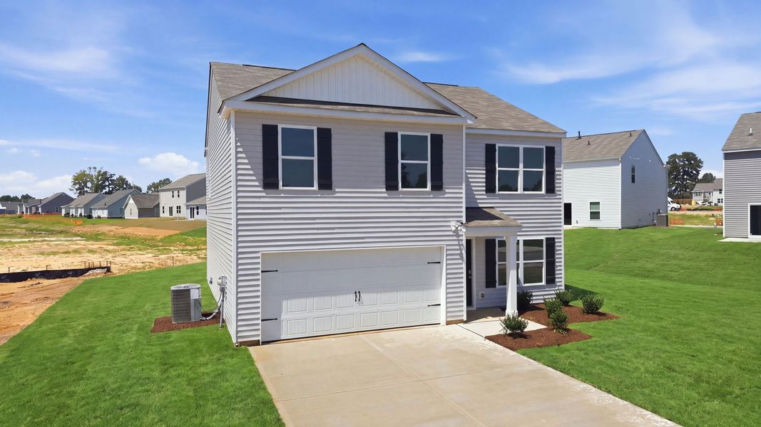Front exterior of a new home in Hunter Hill, Rocky Mount, NC, highlighting curb appeal (Image 2). Front exterior of a new home in Hunter Hill, Rocky Mount, NC, highlighting curb appeal (Image 2).