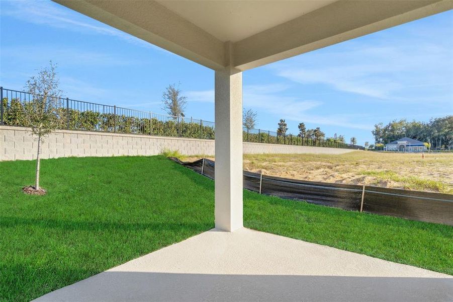 Exterior details and patio area of a home in Seaport Village, Tavares (Image 4).