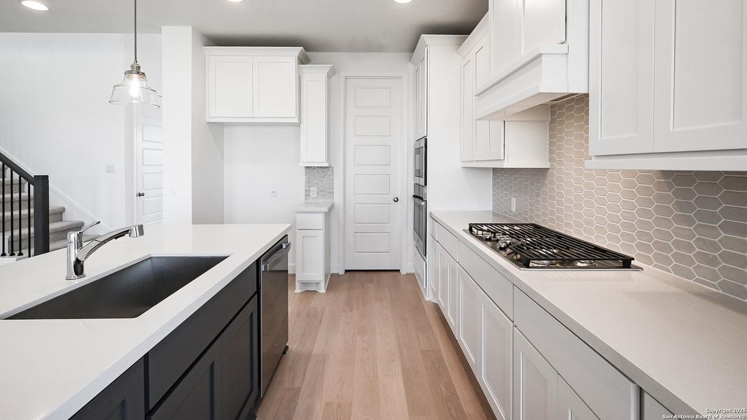 Furnished interior view inside a new home in Homestead 55', Schertz (Image 8).