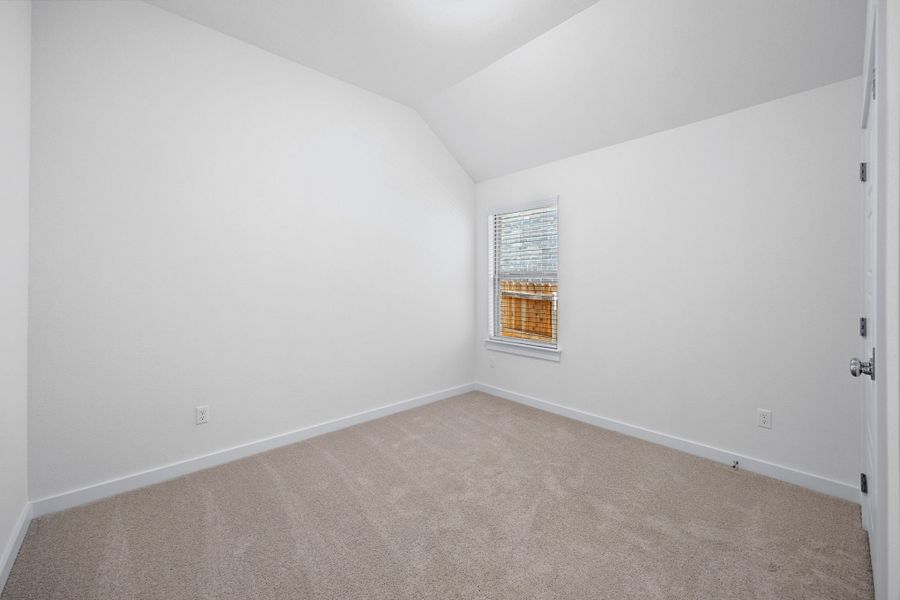 Bedroom in the Cypress home plan by Trophy Signature Homes - REPRESENTATIVE PHOTO Bedroom in the Cypress home plan by Trophy Signature Homes - REPRESENTATIVE PHOTO