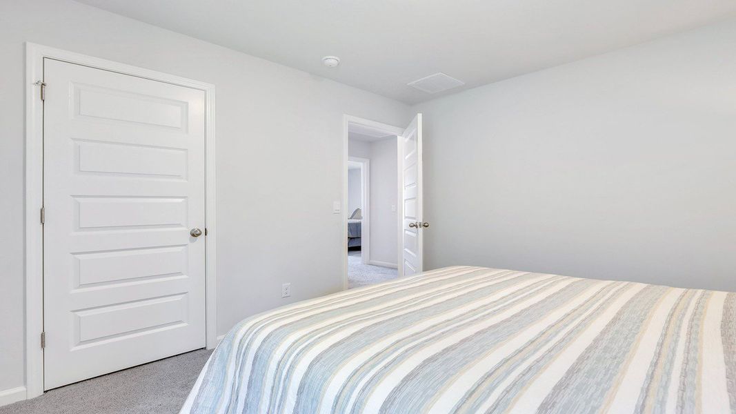 Representative furnished interior of a home built from the ROBIE by D.R. Horton in Longleaf Village, Rincon (Image 29).