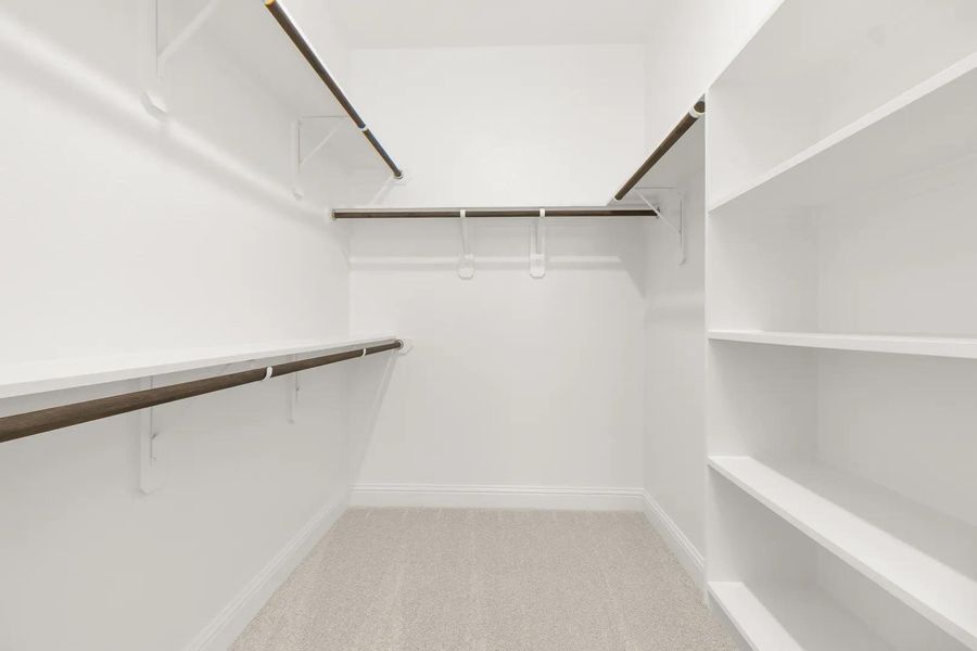 Braeswood B Primary closet Braeswood B Primary closet