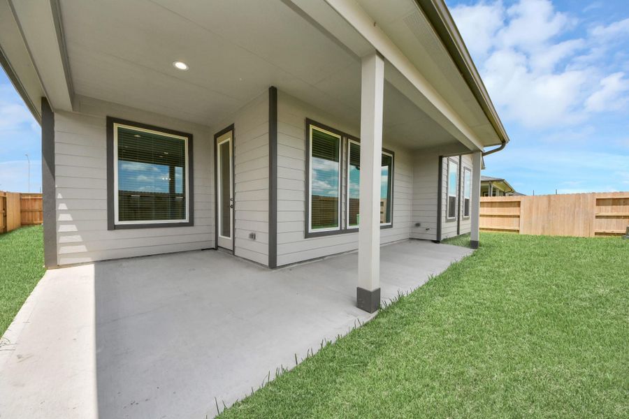 Experience outdoor living at its finest on this expansive covered patio, thoughtfully designed for BBQs and delightful outdoor dining. Experience outdoor living at its finest on this expansive covered patio, thoughtfully designed for BBQs and delightful outdoor dining.
