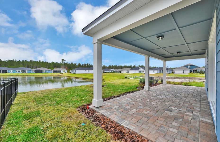 Exterior details and patio area of a home in Del Webb Wildlight, Wildlight (Image 3).