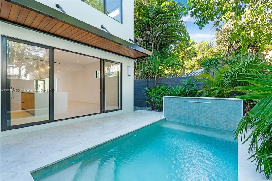 Exterior details and patio area of a home in , Miami (Image 3).