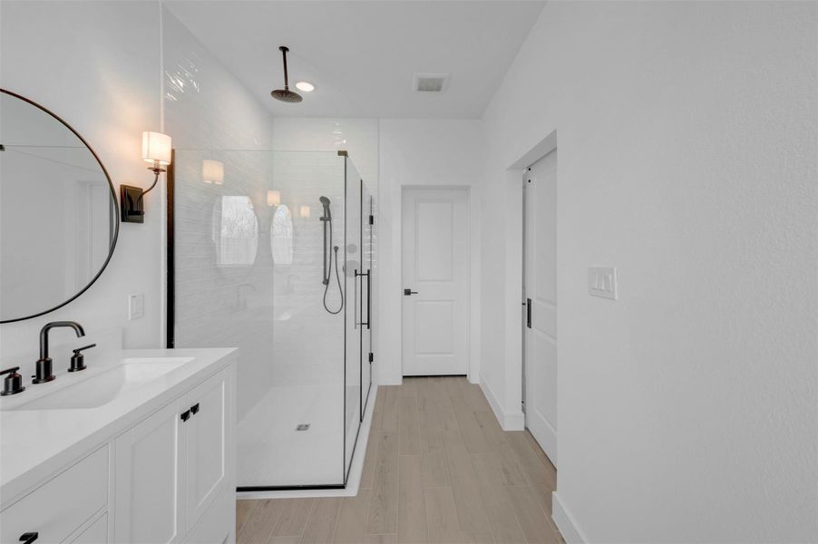 Luxurious primary bath (*Photo not of actual home and used for illustration purposes only.)
