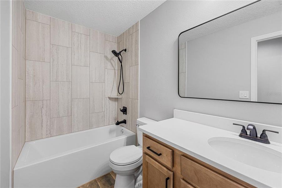 Furnished interior view inside a new home in , Lake Panasoffkee (Image 11).