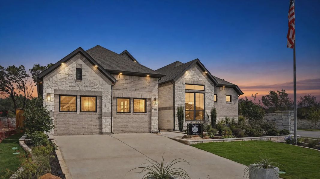 Representative exterior photo of a completed home built from the Drios by Chesmar Homes in 6 Creeks, Kyle, TX (Image 2). Representative exterior photo of a completed home built from the Drios by Chesmar Homes in 6 Creeks, Kyle, TX (Image 2).