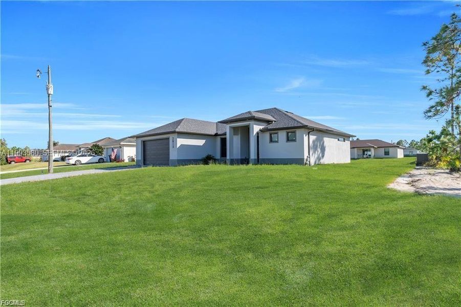 Exterior details and patio area of a home in , Lehigh Acres (Image 26).