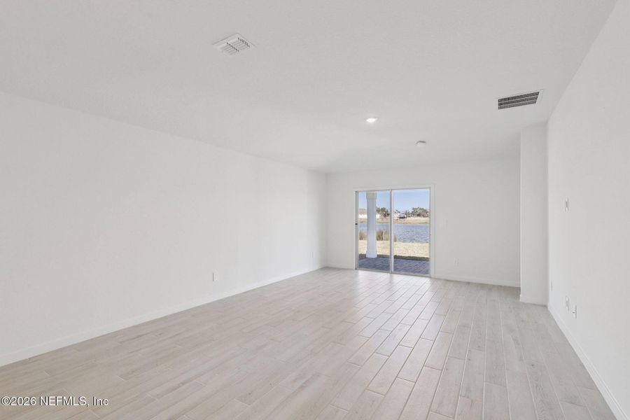 Spacious, unfurnished interior of a new home in Colbert Landings, Palm Coast (Image 23).