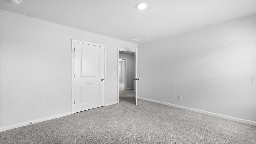Spacious, unfurnished interior of a new home in Pine Hills at Cane Bay, Summerville (Image 19).
