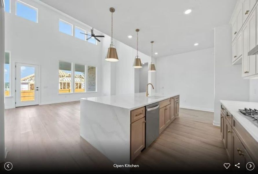 Interior photos- Photo of Pulte model home with same floor plan, not of actual home listed.