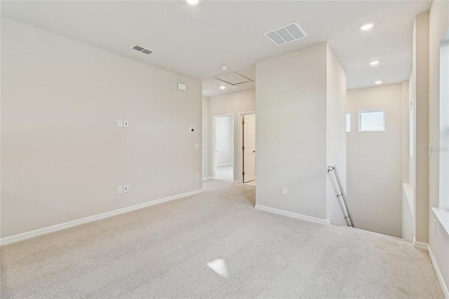 Spacious, unfurnished interior of a new home in Laureate Park at Lake Nona - Garden Series, Orlando (Image 27).